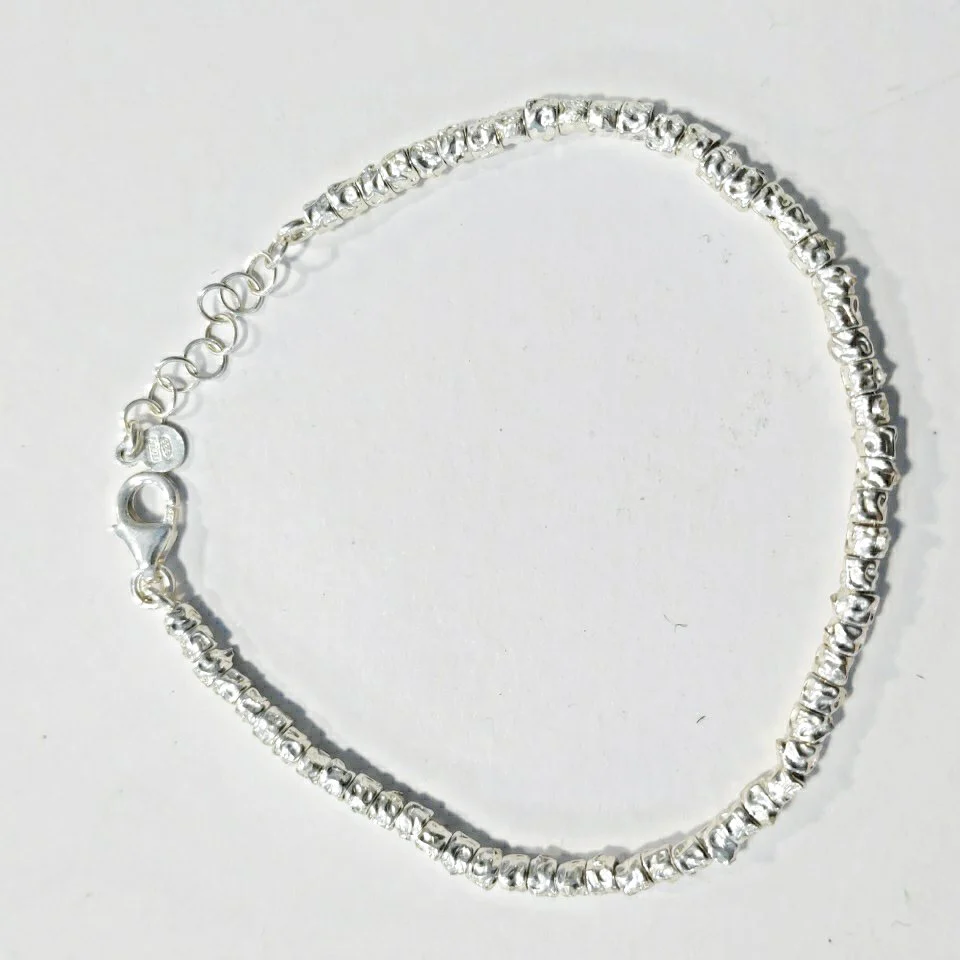 BRACCIALE ARGENTO a tubi martellati piccoli